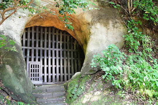 Japanese old rock prison at Kousoku-ji Temple at Kamakura japan. The prison is made in Rocks with wood.