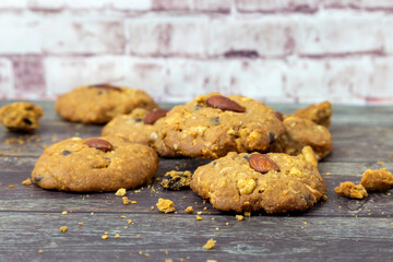 
Almonds cookies placed on a wooden floor