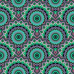Green ethnic tiled mandalas seamless pattern. Colorful tribal background. Floral round bohemian ornaments. Geometric repeat deco backdrop. Boho style design with circles, mandalas, flowers, zig zag