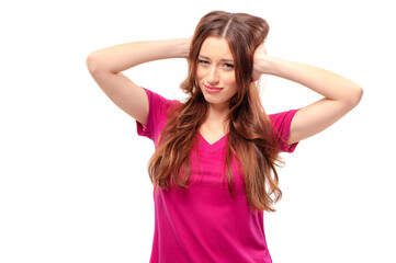 Fototapeta premium Frustrated young woman covering ears