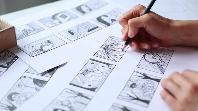 Artist illustrator draws a storyboard for the film. The animator creates sketches for the cartoon.