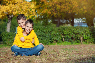 little brothers hugging each other