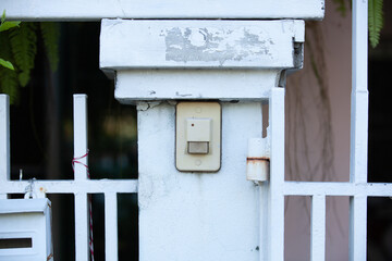 Bell switch on the cracked wall