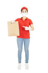 Asian Delivery woman in red uniform isolated on white background.Courier in protective mask and medical gloves delivers takeaway food. Delivery service under quarantine, disease outbreak