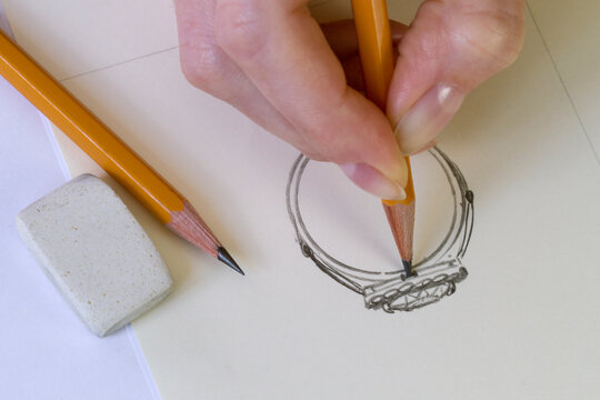 Drawing Jewelry Design. Drawing sketch jewelry on paper . Design Studio. Creativity Ideas.