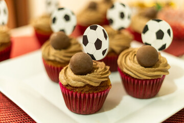 chocolate soccer cupcake in the table