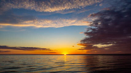 Sunset on the beach. Beautiful clouds.