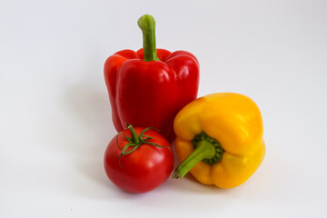 Fresh summer vegetables for salad. Sweet red tomatoes and pepper. Food for vegetarians