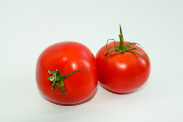 Fresh summer vegetables for salad. Sweet red tomatoes and pepper. Food for vegetarians
