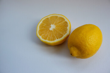 Citrus. Ripe yellow lemon on a white background