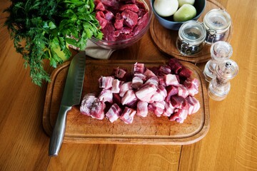 Obraz na płótnie Canvas raw meat, Raw beef goulash meat diced