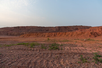 Sandy gravel ground surface and earth slope on construction land