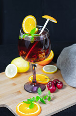 drink in glass with fruit decorations on the table