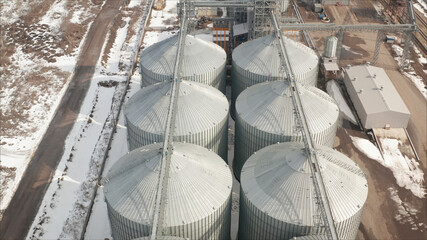 Metal grain elevator in agricultural zone. Industrial elevator
