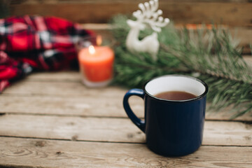 Flat lay winter cozy Christmas vintage background with. The cup of tea or coffee. Christmas atmosphere.