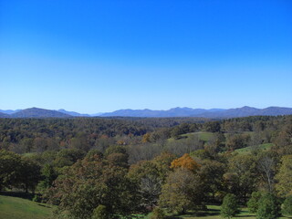 Scenic view to the Smoky Mountains of North Carolina at a blue sky day during fall.