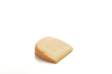 Hard Dutch gouda cheese on white