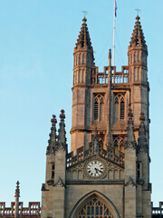 Fototapeta na wymiar Tower and clock of Bath Abbey, England