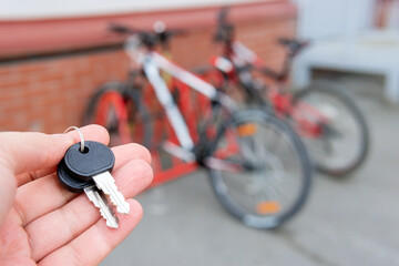 keys on the background of a bicycle. Protecting a mountain bike from theft