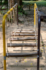 the rope and wood ladder at playground in Thailand. - 355906132