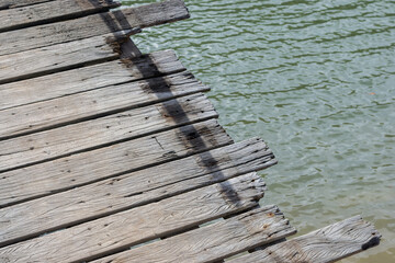 Close up of the old wooden pier in Thailand with copy space. - 355906718
