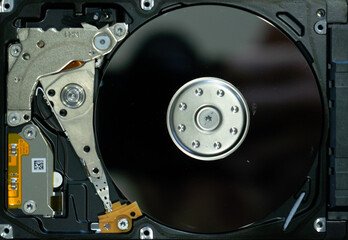 Disassembled hard drive from the computer