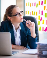Beautiful female employee with many conflicting priorities
