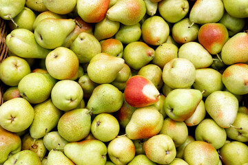 Pears harvest background on shelves in supermarket may use as background close up