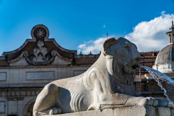Fototapeta na wymiar Lion fountain in Piazza del Popolo with church dome Rome, Italy