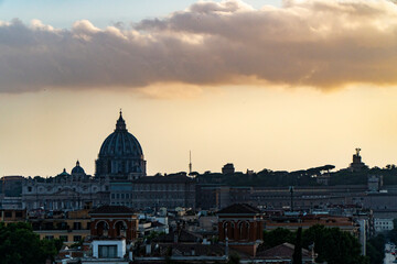 Fototapeta na wymiar Rome landscape with roof and the vatican dome in the background