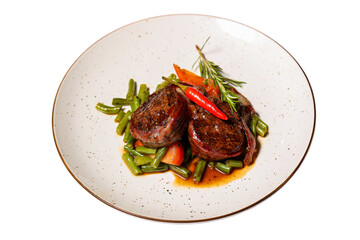 Veal medallions on a white background