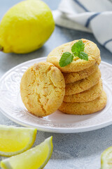 Homemade freshly baked citrus cookies with lemon and white chocolate. Dessert for gourmets. Selective focus