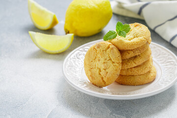 Homemade freshly baked citrus cookies with lemon and white chocolate. Dessert for gourmets. Selective focus,  copy space