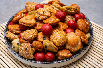 Tasty asian vegetarian appetizer, crunchy rice en peanuts snacks from Japan