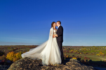Wedding photo of a couple in the mountains