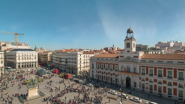 Madrid Spain time lapse 4K, high angle view city skyline timelapse at Puerta del Sol