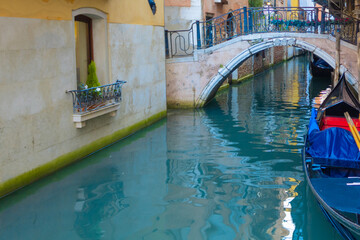 Fototapeta na wymiar Venetian gondola on a quiet canal street