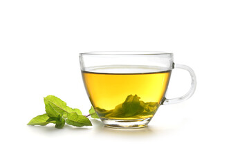 herbal tea made from fresh peppermint leaves in a glass cup isolated on a white background