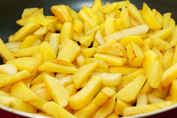 cooking fried, raw potatoes background texture