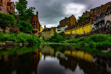 Fototapeta premium view from the river at the old town of Dean village, Edinburgh, Scotland, UK.