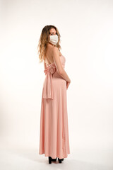 Woman wearing surgical mask on a white background