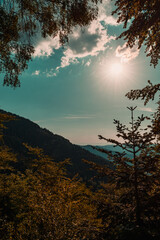 Obraz premium Sun over the mountains of Germany's Black Forest (Schwarzwald)