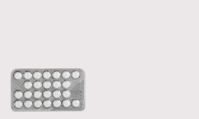 Pills drugs medicine tablets on a white background