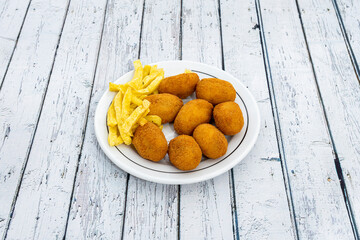 Delicious plate of ration of Spanish croquettes