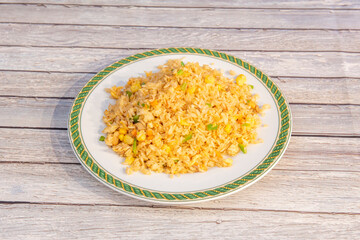 Thai rice dish on wooden table