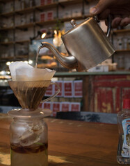 Iced coffee with lemon, roasted beans