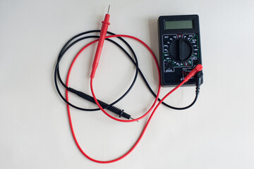 Miltimeter, a tool for measuring electricity, voltage and resistance on a light background