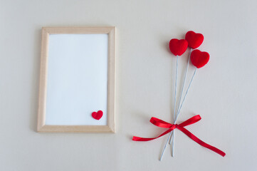 Frame with a red heart and a bouquet of hearts