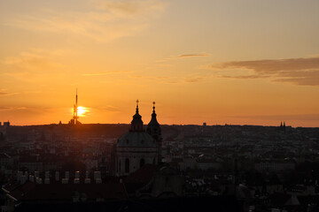 Dawn over Prague. The urban skyline of an ancient European city at dusk.