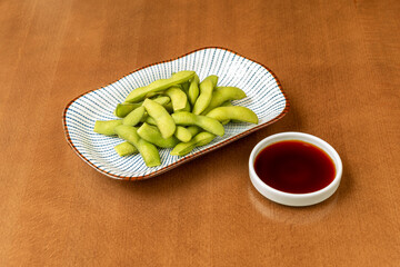 Edamame plate on wooden table